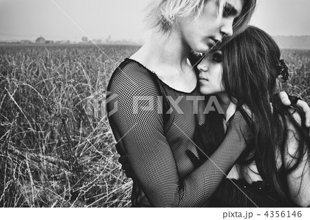 Young goth couple outdoors 4356146