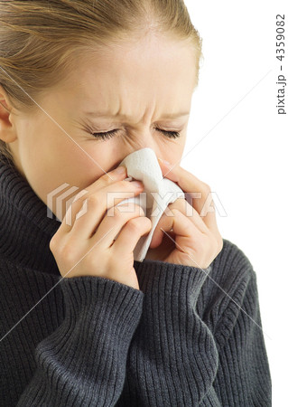 A sneezing woman A sneezing woman 4359082