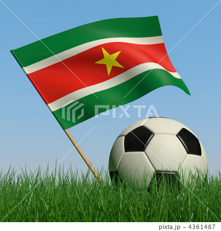 Soccer ball in the grass and the flag of Surinam Soccer ball in the grass and the flag of Surinam 4361487