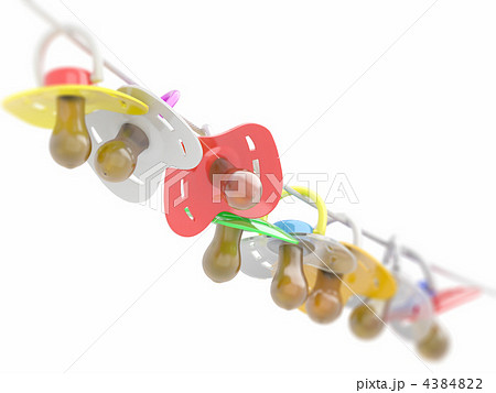 Row of babies dummies on rope. 4384822