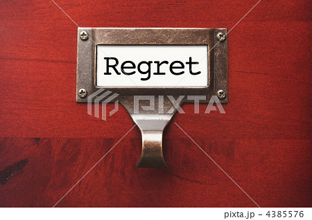 Lustrous Wooden Cabinet with Regret File Label 4385576