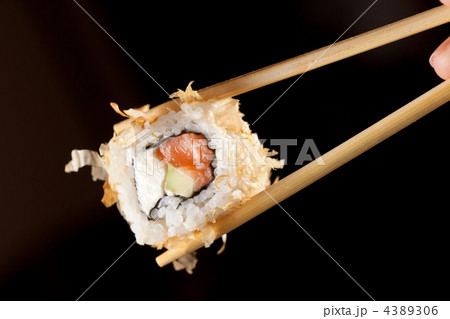 Sushi with chopsticks Sushi with chopsticks 4389306