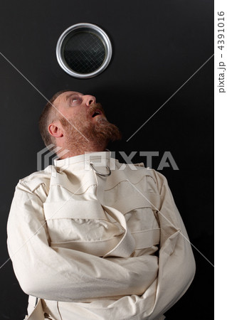 Paranoid man in a straitjacket Paranoid man in a straitjacket 4391016