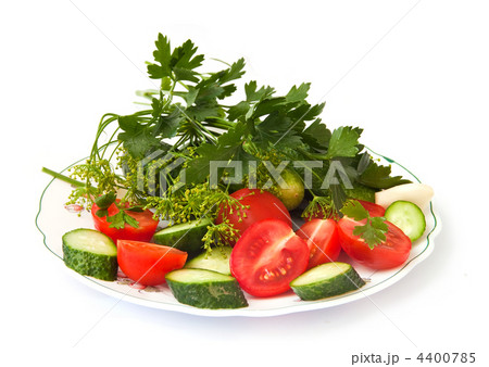 Fresh vegetables, cucumbers, tomatoes, garlic and fresh herbs, isolated on a white background. Fresh vegetables, cucumbers, tomatoes, garlic and fresh herbs, isolated on a white background. 4400785