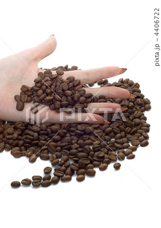 Female hand and coffee beans Female hand and coffee beans 4406722