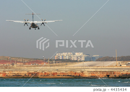 Passenger airplane landing on runway. Passenger airplane landing on runway. 4435434
