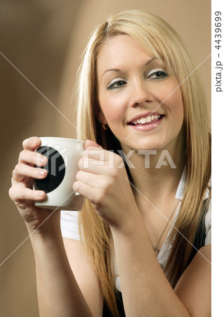 Happy coffee drinker Happy coffee drinker 4439699