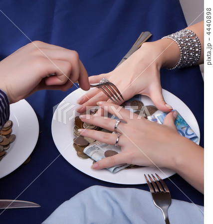 hand with a fork for the money runs hand with a fork for the money runs 4440898