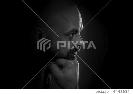 man portrait in dark light 4442654