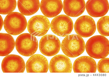 Carrot background on white with backlight /  macro 4443080