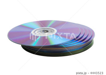 Heap of cd disks isolated over white 4443523