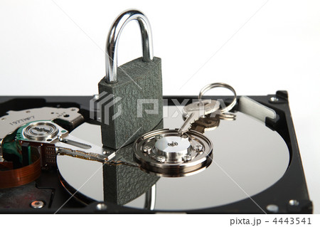 Padlock and key on hard drive 4443541