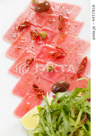 Fish Carpaccio with olives ana salad Fish Carpaccio with olives ana salad 4457816