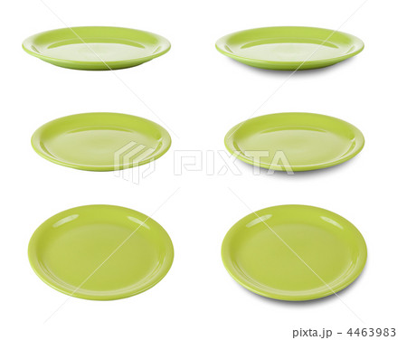 Set of green round plates or dishes isloated on white with clipp 4463983