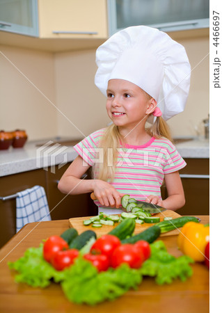 Little girl preparing healthy food on kitchen 4466697