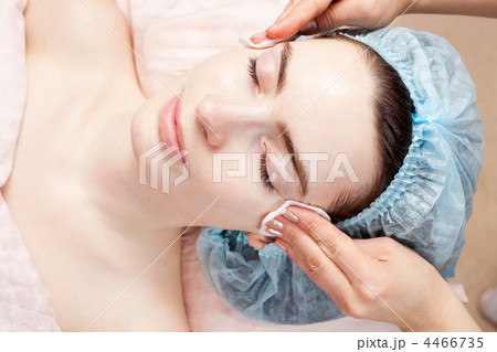 Beautiful woman with clear skin getting beauty treatment of her Beautiful woman with clear skin getting beauty treatment of her 4466735