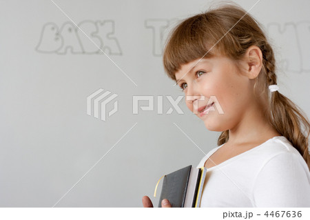 Cute preteen schoolgirl portrait near whiteboard 4467636