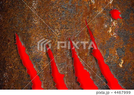 Torn rusty metal texture over red background 4467999