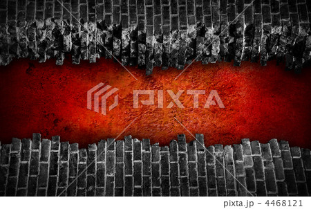 Broken black brick wall  with large red hole 4468121