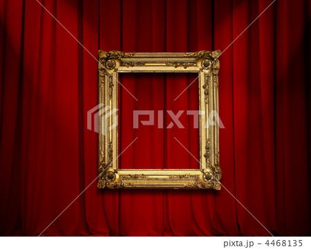 Empty golden painting frame on red curtain wall 4468135