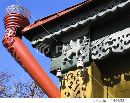 fragment of a old Russian house with decorative carvings and rai fragment of a old Russian house with decorative carvings and rai 4468524