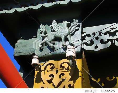 fragment of a old house with decorative carvings fragment of a old house with decorative carvings 4468525