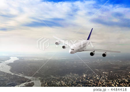 Modern airplane in the sky near Airport. Modern airplane in the sky near Airport. 4484418