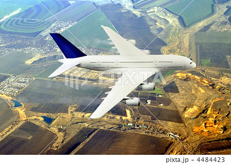 Modern airplane in the sky near Airport. Modern airplane in the sky near Airport. 4484423
