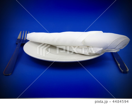 Table serving-knife,spoon,fork on blue backdrop. Table serving-knife,spoon,fork on blue backdrop. 4484594