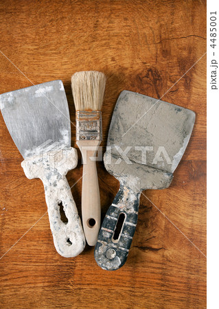 Different tools on a wooden background. Different tools on a wooden background. 4485001