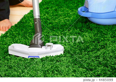 The metal pipe of vacuum cleaner in action -clean a carpet and floor 4485099