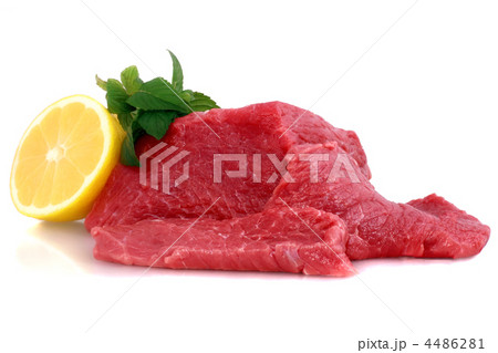 Cut of  beef steak with lemon slice. 4486281