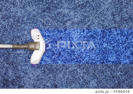 The metal pipe of vacuum cleaner in action The metal pipe of vacuum cleaner in action 4486848