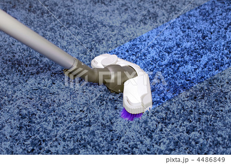 The metal pipe of vacuum cleaner in action The metal pipe of vacuum cleaner in action 4486849
