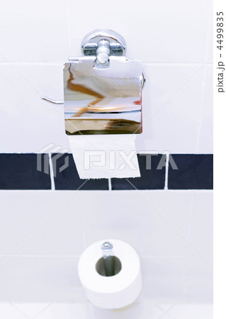 Roll of toilet paper holder in the toilet. Roll of toilet paper holder in the toilet. 4499835