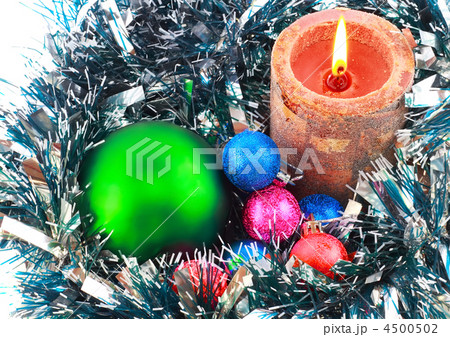 New Year decoration- balls, tinsel, candels. New Year decoration- balls, tinsel, candels. 4500502