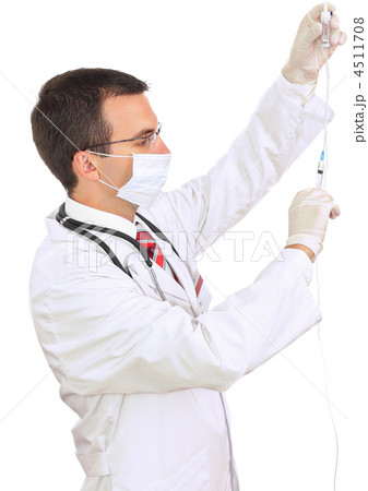 Doctor attach syringe medication . Isolated Doctor attach syringe medication . Isolated 4511708