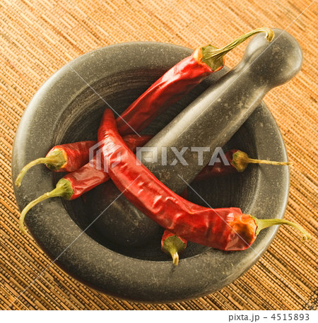 stone mortar with red chillies stone mortar with red chillies 4515893