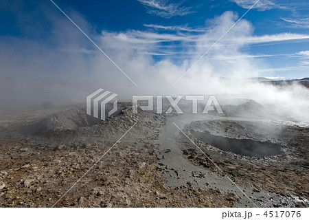 mud geyser over blue sky, altiplano, bolivia 4517076