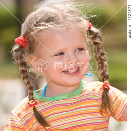 Cute child with long hair. Nature. Cute child with long hair. Nature. 4529372