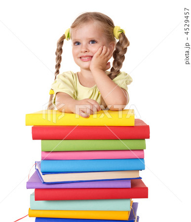 Child holding pile of books. 4529457