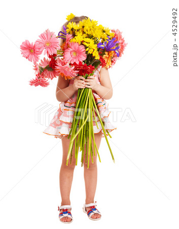 Child holding flowers. 4529492