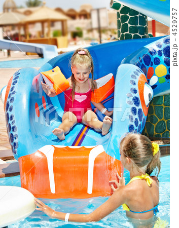 Children on water slide at aquapark. 4529757