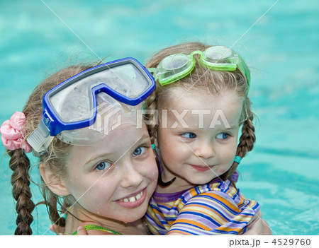 Children swim in swimming pool. 4529760