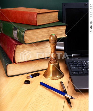 Books and laptop. School supplies. 4530337