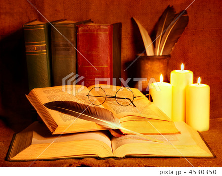 Stack old book and candle. 4530350