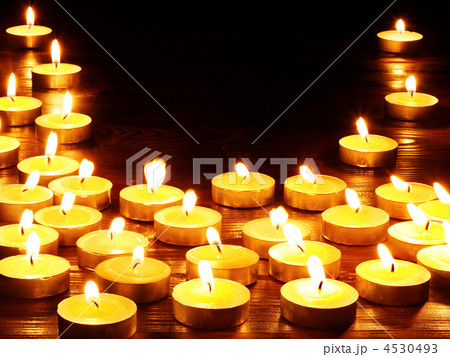 Group of candles on black background. Group of candles on black background. 4530493