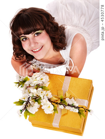 Beautiful girl with red gift box and flower. Beautiful girl with red gift box and flower. 4530778