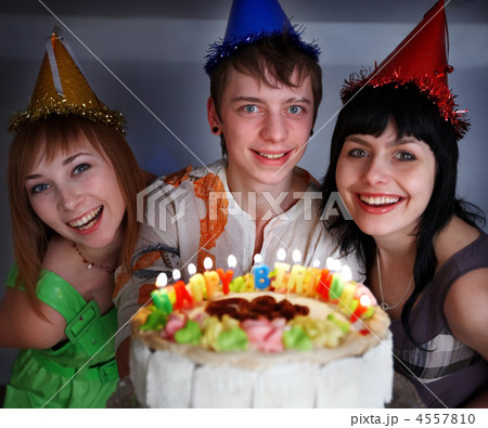 Group of teenagers with cake celebrate happy birthday. Group of teenagers with cake celebrate happy birthday. 4557810