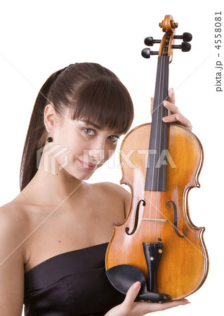 Beautiful young girl with fiddle. Beautiful young girl with fiddle. 4558081